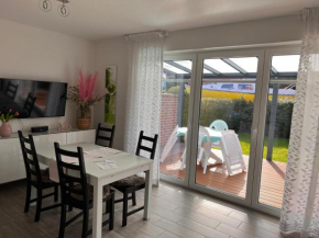 Ostfrieslands Perle Ferienwohnung an der Nordseeküste, Sauna, Terrasse, Garten, ruhige Lage, WLAN